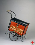 Newspaper cart with the logo of the 