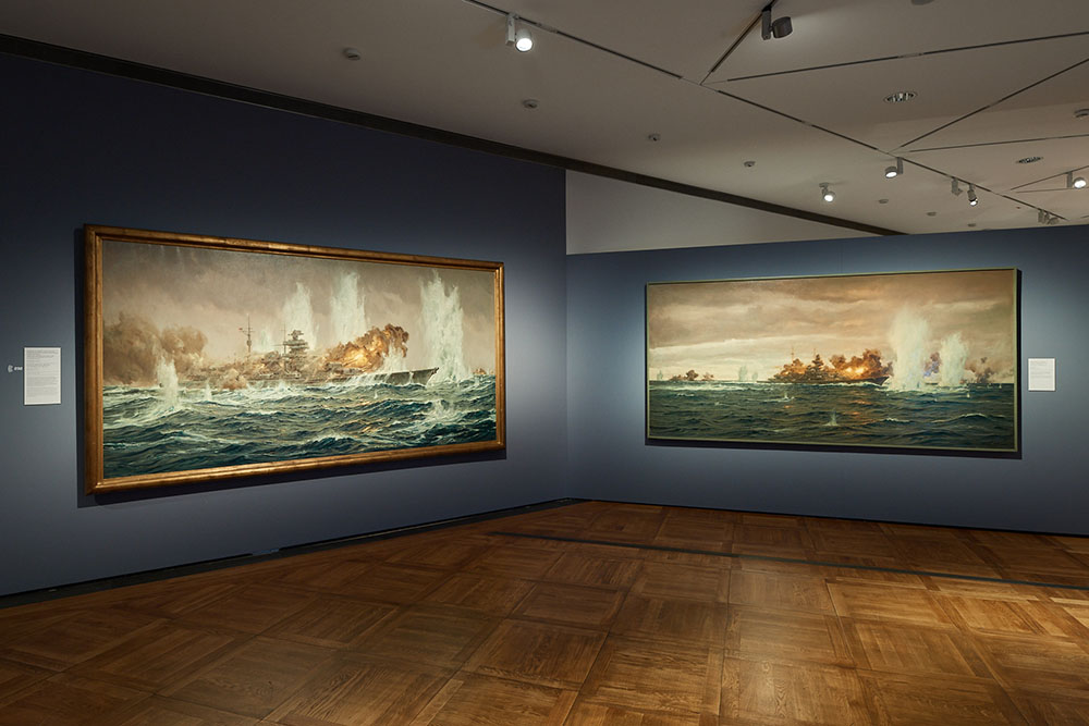 View of the DHM exhibition: “The Last Battle of the ‘Bismarck’” (1949) and “Heavy Cruiser ‘Prinz Eugen’ in the Battle of the Denmark Strait” (1944), DHM Berlin. “‘Divinely Gifted’. National Socialism’s Favoured Artists in the Federal Republic”, 26.8.–5.12.2021, photo: Yves Sucksdorff, 2021