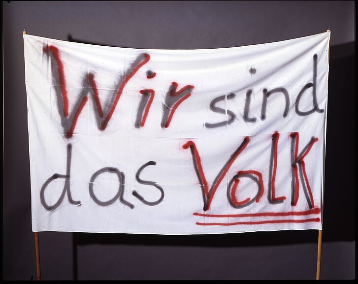 Demonstrationsschild "Wir sind das Volk".
