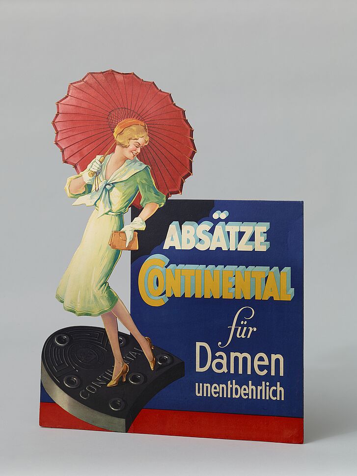 Aufsteller mit Frau mit Schirm.