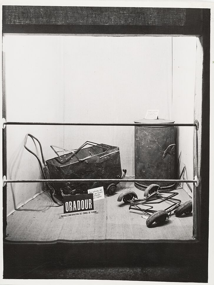 Objects from victims of the Oradour-sur-Glane massacre in the exhibition “Crimes hitlériens”, Grand Palais, Paris, 1945 © Ministère de l’Europe et des Affaires étrangères, Centre des Archives diplomatiques, La Courneuve Objects from victims of the Oradour-sur-Glane massacre in the exhibition “Crimes hitlériens”, Grand Palais, Paris, 1945 © Ministère de l’Europe et des Affaires étrangères, Centre des Archives diplomatiques, La Courneuve