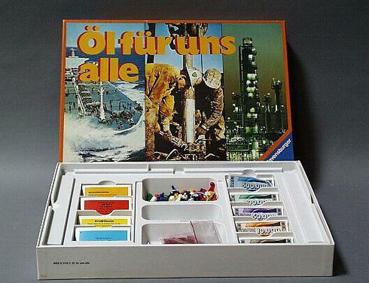 Geöffnetes Gesellschaftsspiel "Öl für uns alle".