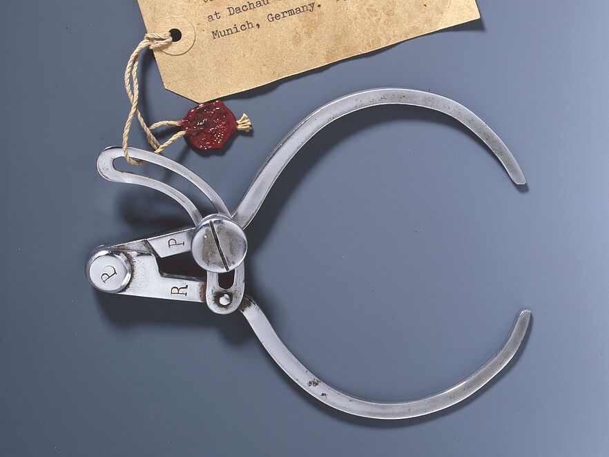 Craniometer from the Dachau concentration camp with inventory label and seal of the US Army