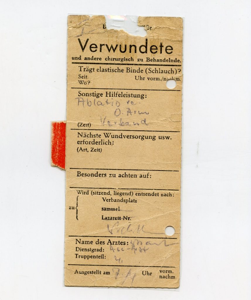 Transportation certificate for a wounded 16-year-old soldier, including note from medical officer for the amputation of his upper right arm, dated 7 April 1945 © DHM