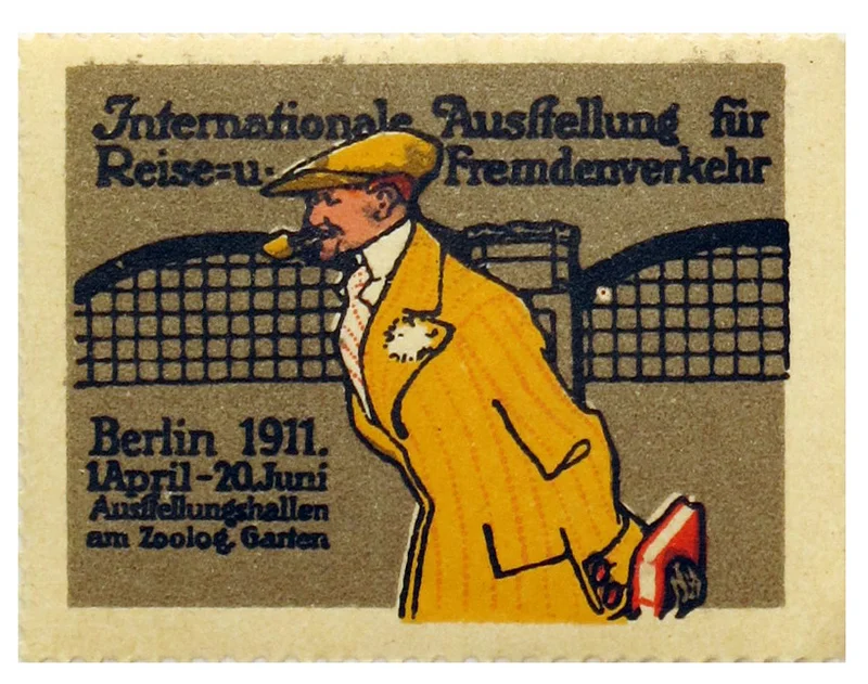 Historic promotional poster for the "International Exhibition for Travel and Tourism," Berlin, 1911. A well-dressed man in a yellow coat and flat cap, smoking a pipe and carrying a suitcase, walks in front of a stylized railway station. The text announces the exhibition from April 1 to June 20 at the exhibition halls by the Zoological Garden.