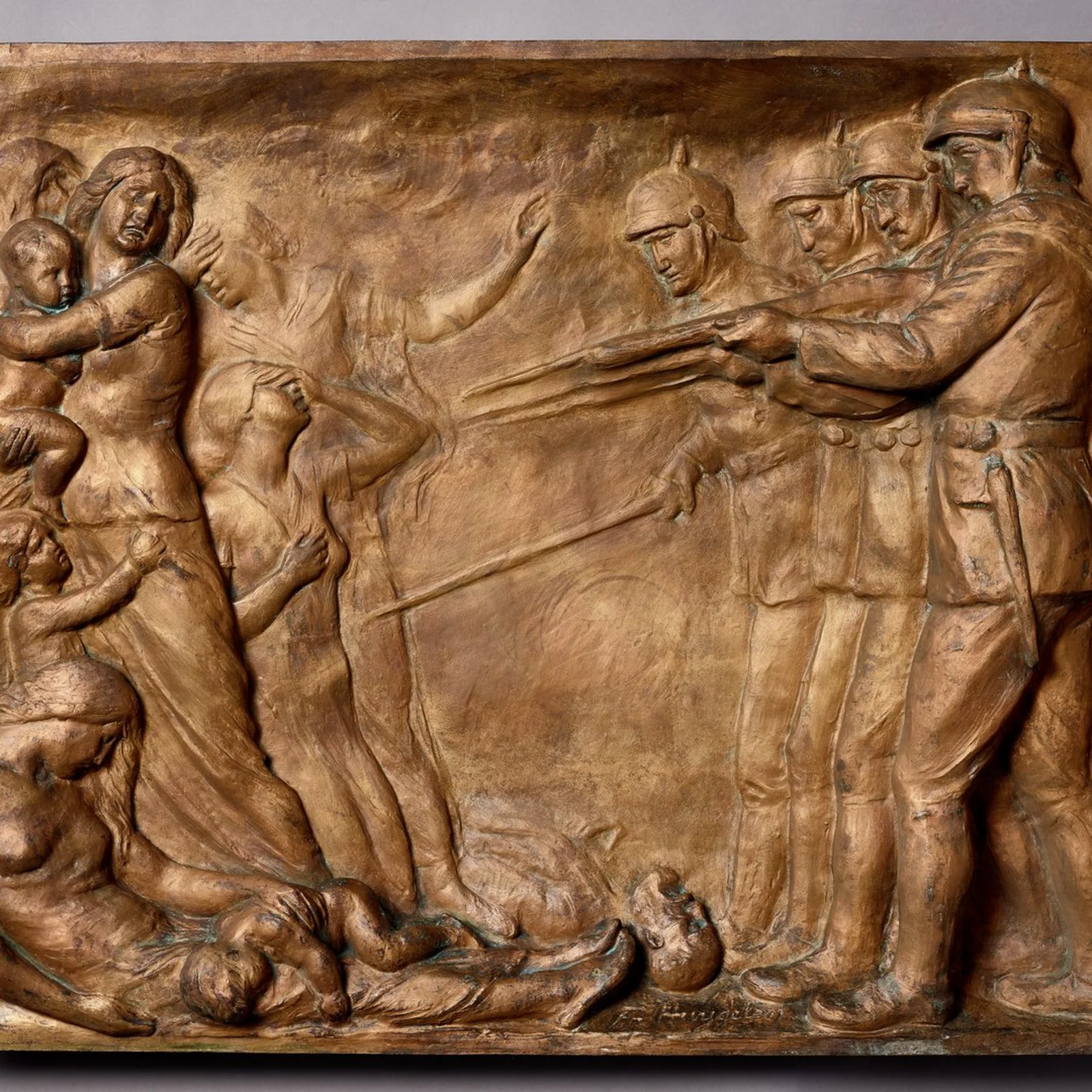 Foto des Reliefs von Frans Huygelen „Zur Erinnerung an Dinant“, um 1927, Bronz