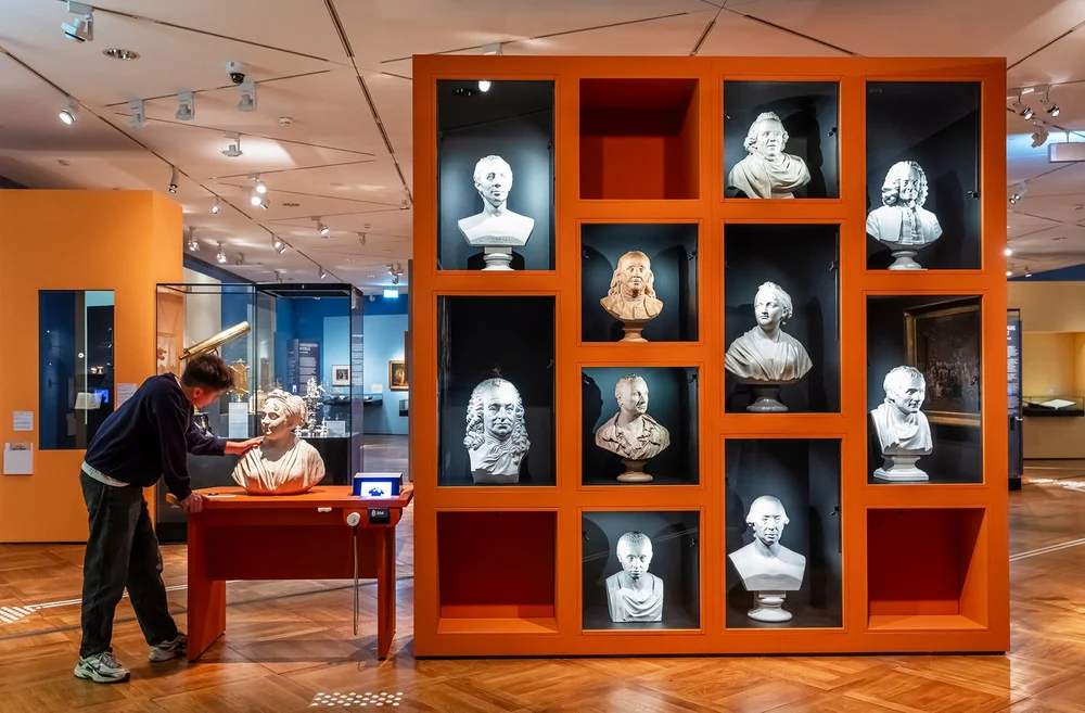 Showcase with portrait busts