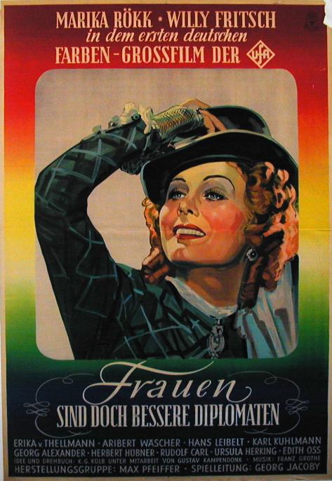 Farbiges Plakat zum Ufa-Farbfilm "Frauen sind doch bessere Diplomaten", gezeigt wird geschminkte Frau mit Hut